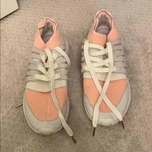 Pink and white adidas shoes